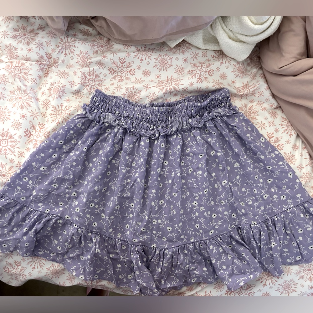Zara purple dress with white flowers all over the skirt.